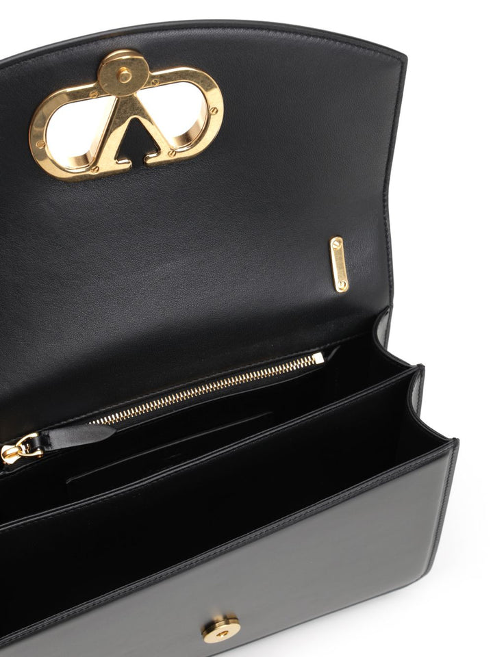 Valentino Garavani Vain Shoulder Bags - Black | 9a1c116fa21babb46700d168a2e87e36bd572325