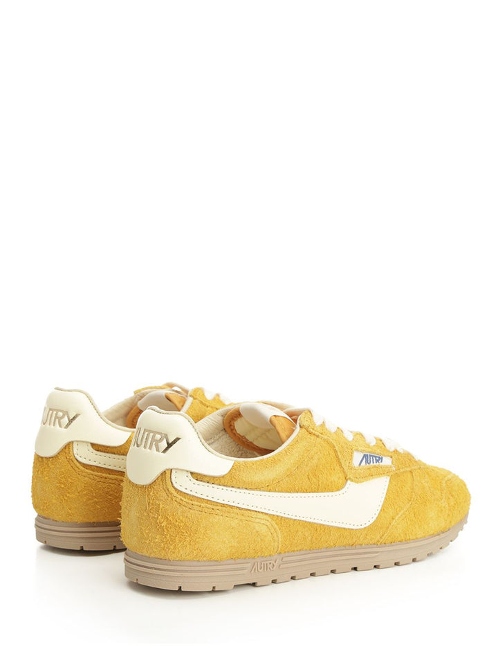 Autry  Windspin Sneaker In Perforated Leather Sneakers - Yellow | 6c52f160a09de347e56d4bd1b9d0250713853517
