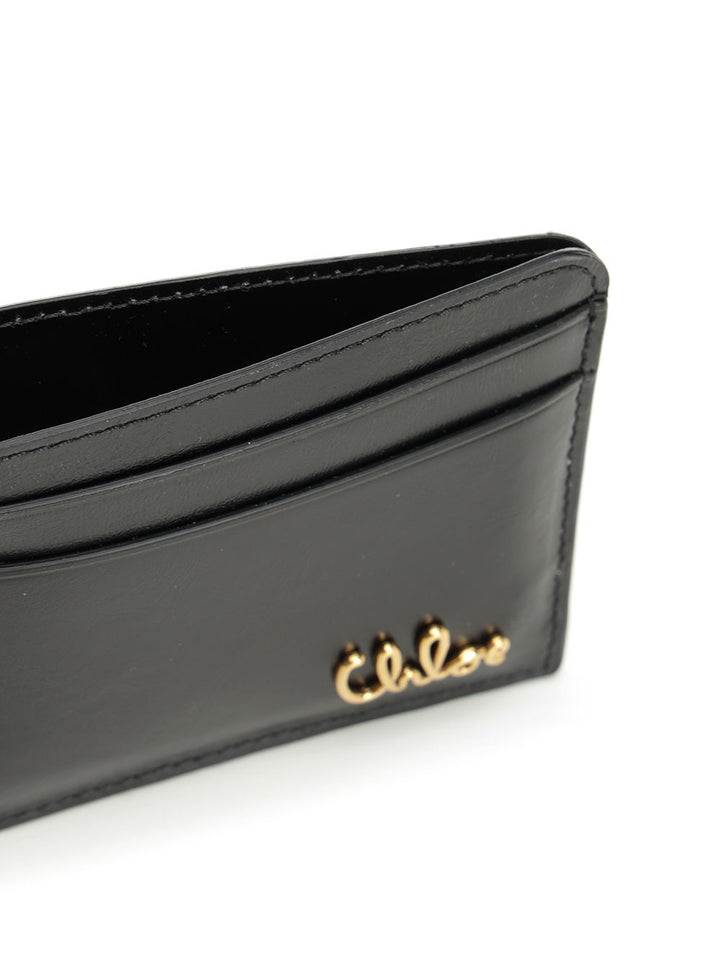 Chloe' Chloé Iconic Wallets - Black | ef6480e1171f2ab1463a07fbdec2640e0e7c4eff
