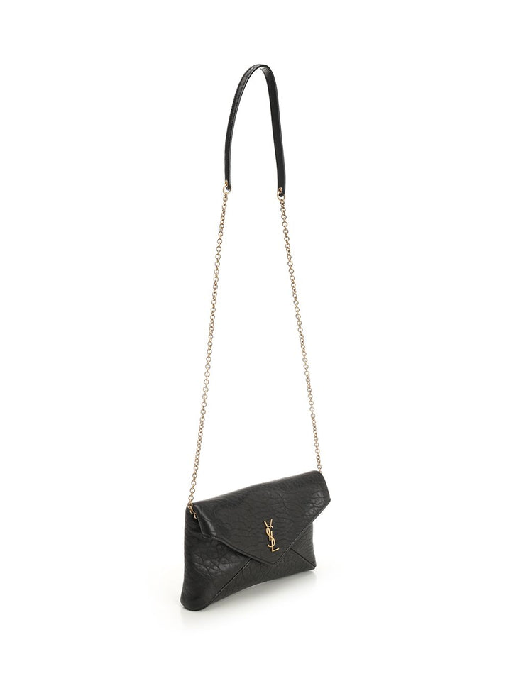 Saint Laurent Cassandre Chain Clutch Clutches - Black | 8cd59686503da363066237a7182f2e70344570f2