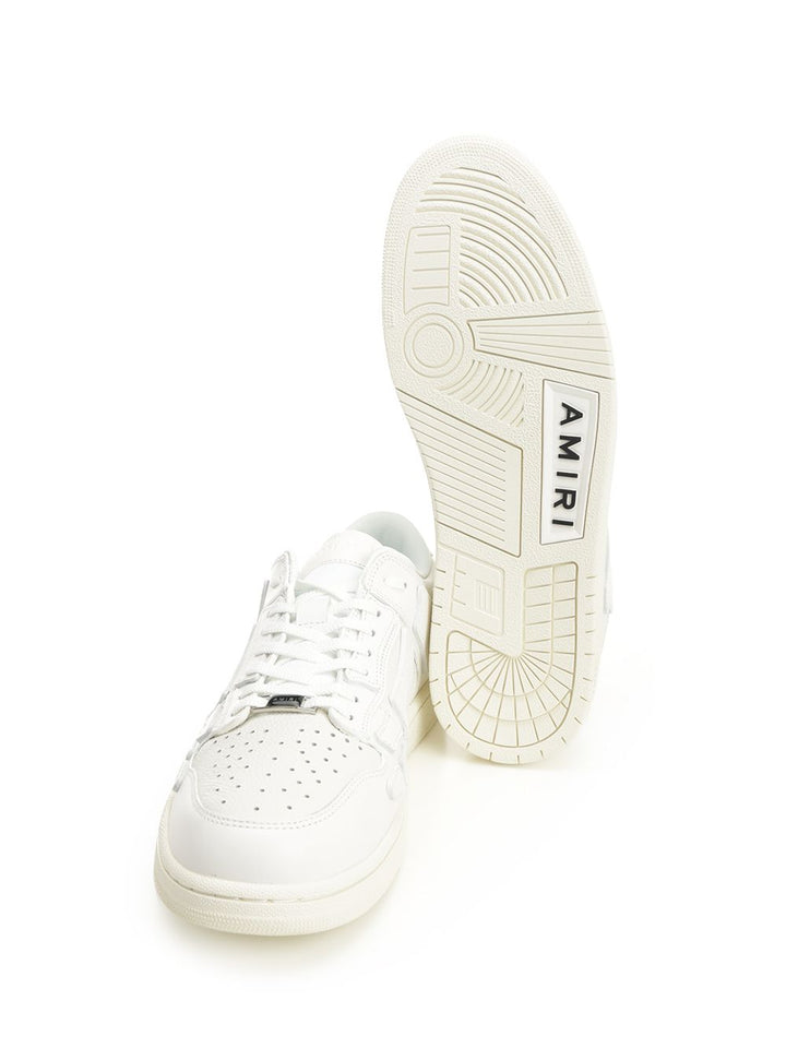 Amiri Skel Top Low Sneakers - White | b21ebf5bda611dace12f247e04c54819442387e1