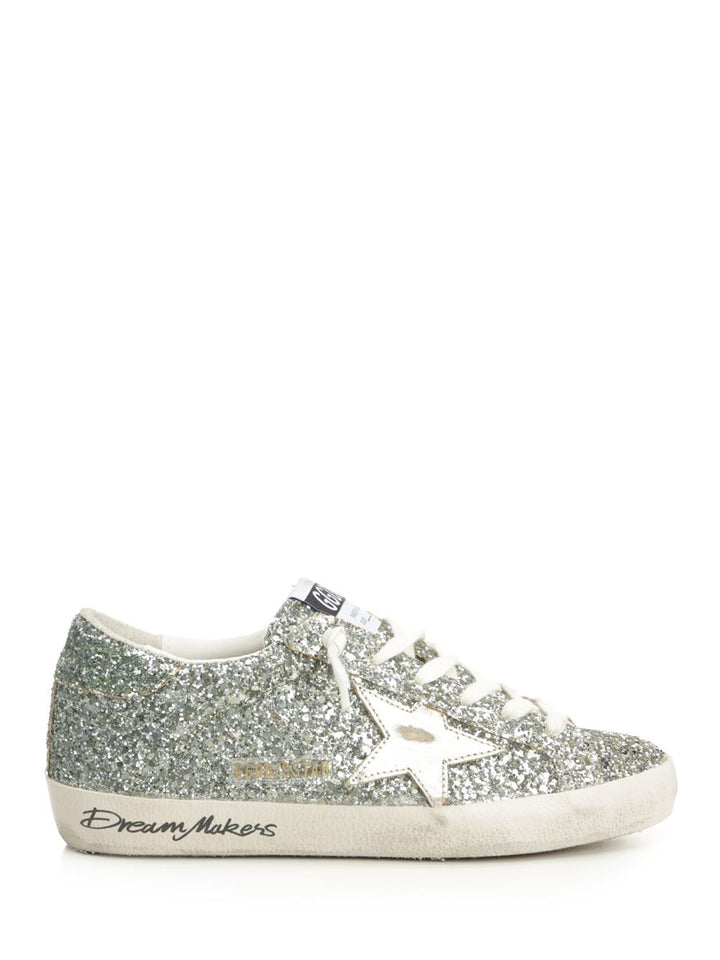 Golden Goose Deluxe Brand Super Star Glitter Upper Toe Tongue And Heel Laminated Star Sneakers - Silver | 3d4476e04a068ee183f7a8b416a920d4e9cbebab