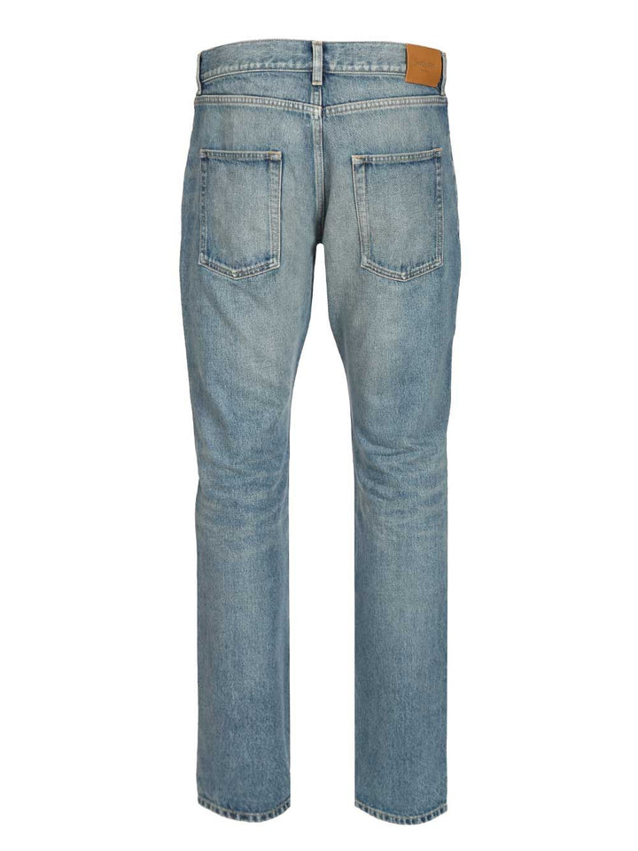 Saint Laurent Slim Relaxed Low Rise  In Blue Denim Jeans - Blue | 358774ef65cb284e8a771141d77a55b05ad3888e