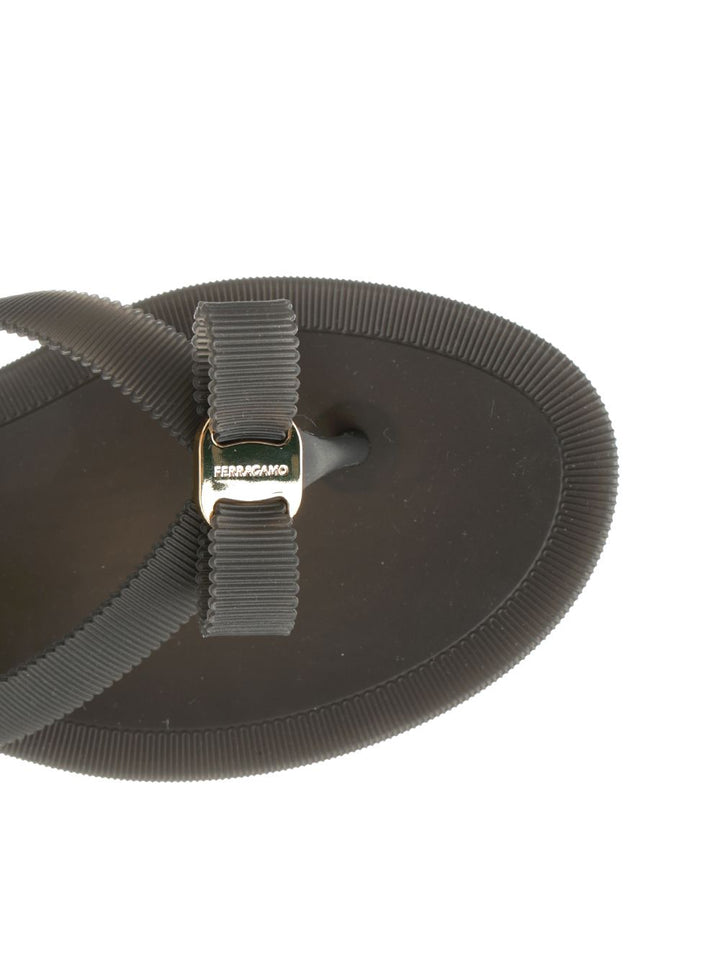 Ferragamo Vara Flip-Flops With Jelly Bow Sandals - Black | ccea1cc3c0ad9fe87a8b79dd47845c58134b6cbf