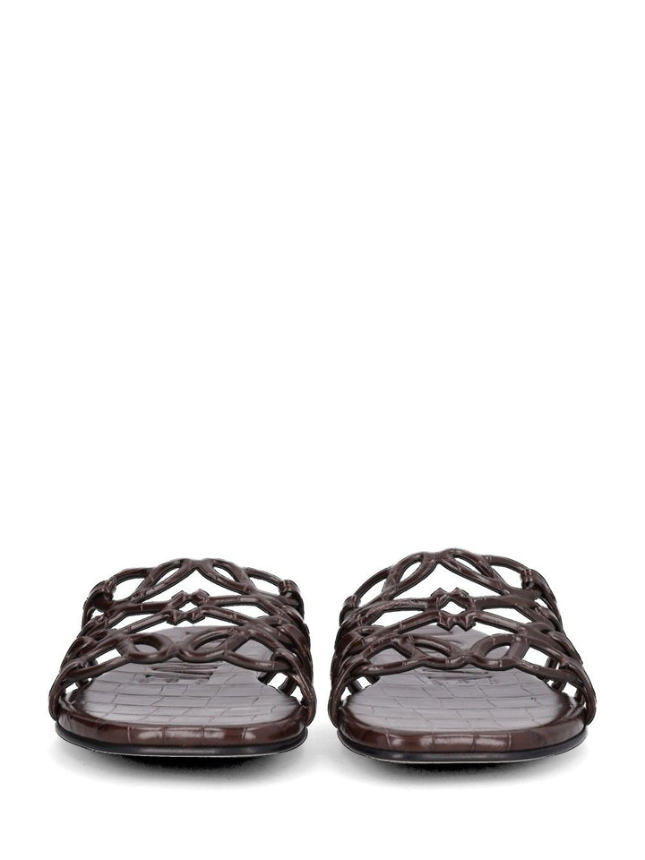 Loewe “Petal Anagram” Slides Sandals - Brown | 492b09bb3e8af35986d3df097ae1a7cc70a1a8b7