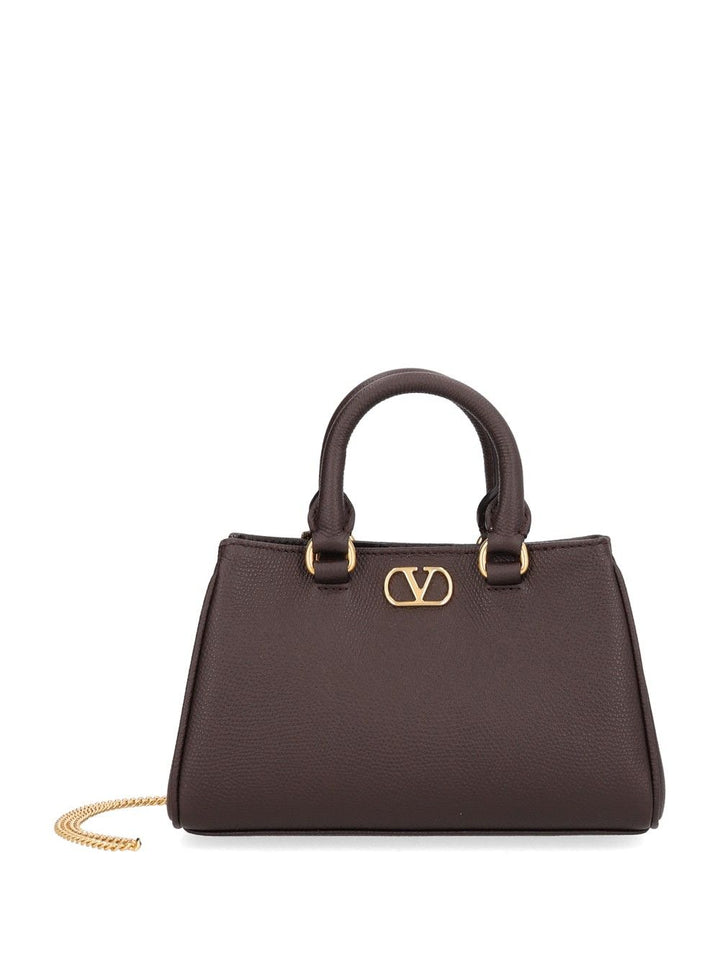 Valentino Garavani Vlogo Signature Mini Bag Vit. Soft Grain/A.Brass Logo Handbags - Brown | 93361de03557acd0e94b64608d9bb4905fcbce19