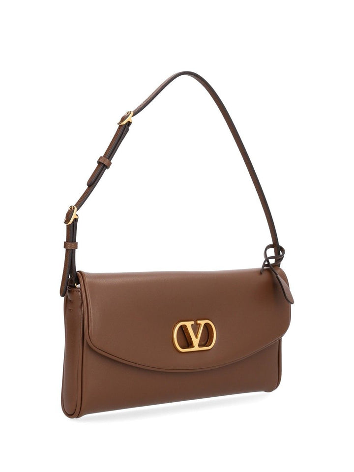 Valentino Garavani Devain Small Shoulder Bag Nappa Deluxe/Vit.Soft Grain L./A.Brass L Shoulder Bags - Brown | 896c533226f255319e576b0943a3c8b22217b507