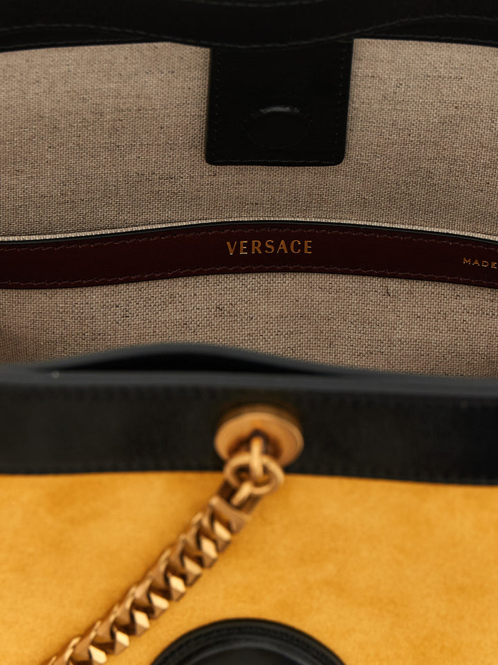Versace Pivot Shoulder Bags - Yellow | 58c60dc108cf69f3895578f5f06859bffd6a291b