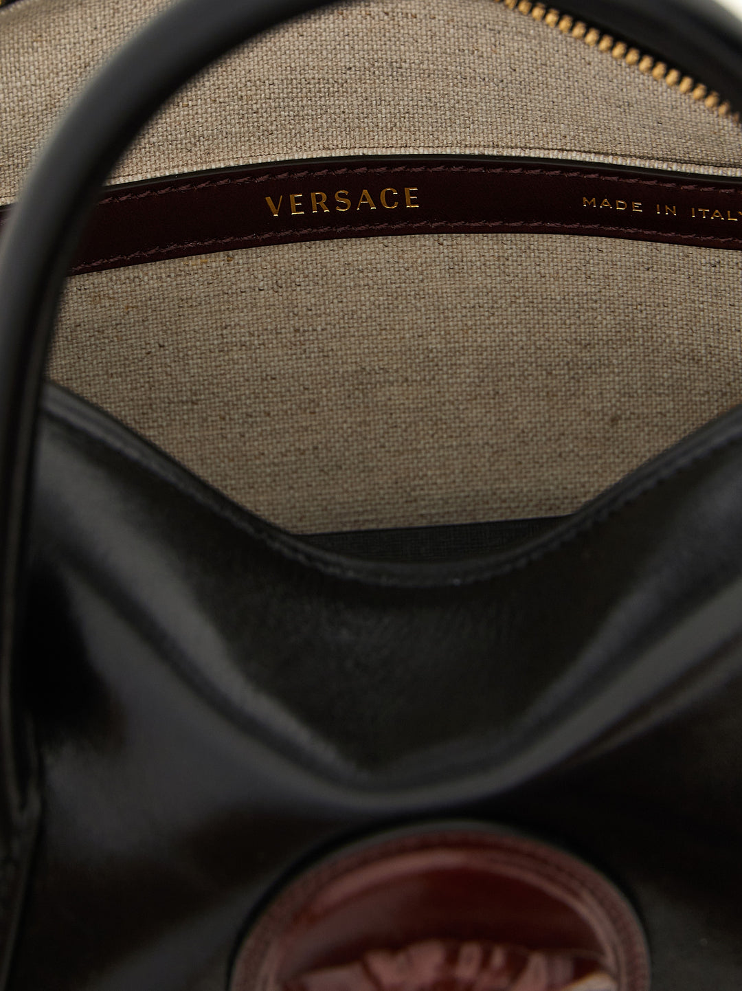 Versace Roomy Hand Bags - Black | 2f5077043447f73bdc1515c308bbe3d4c80b89b7