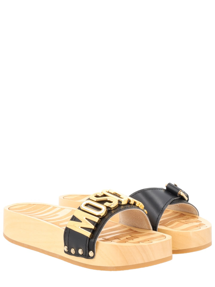Moschino Sandals - Black | a17a34b9dcbb57fbd5726089e017bec7be200167