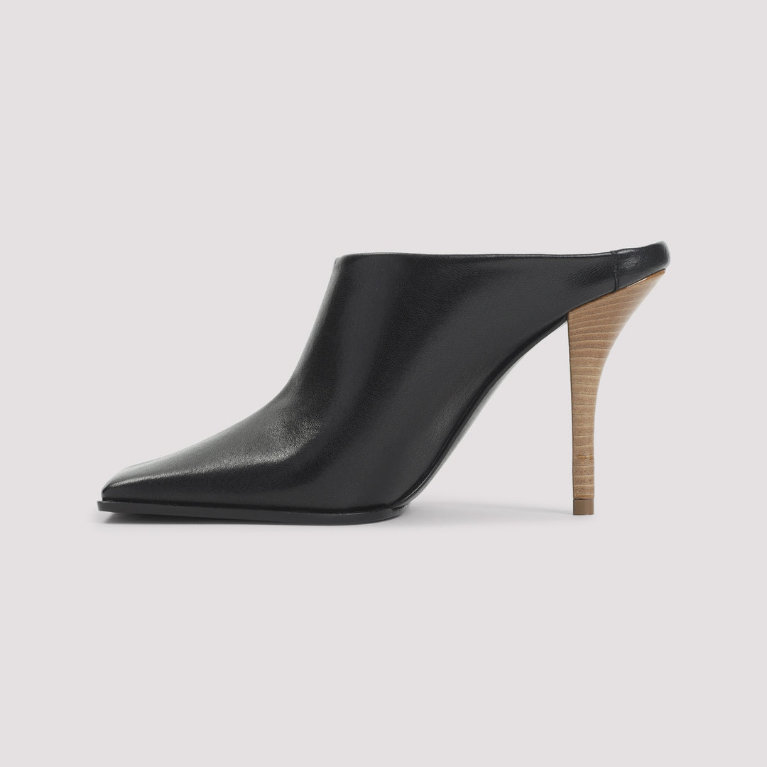 AlaÏA Mules - Black | a31ed2e74771f3dcebba37c9c71f3c9cd50e1275