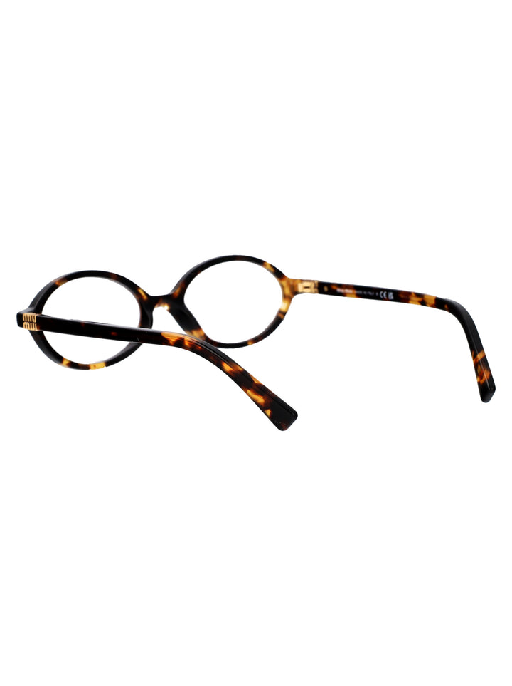 Miu Miu SUNGLASSES - Brown | fb02a6abd10b052a8c489c982a8d049c999b2cc3