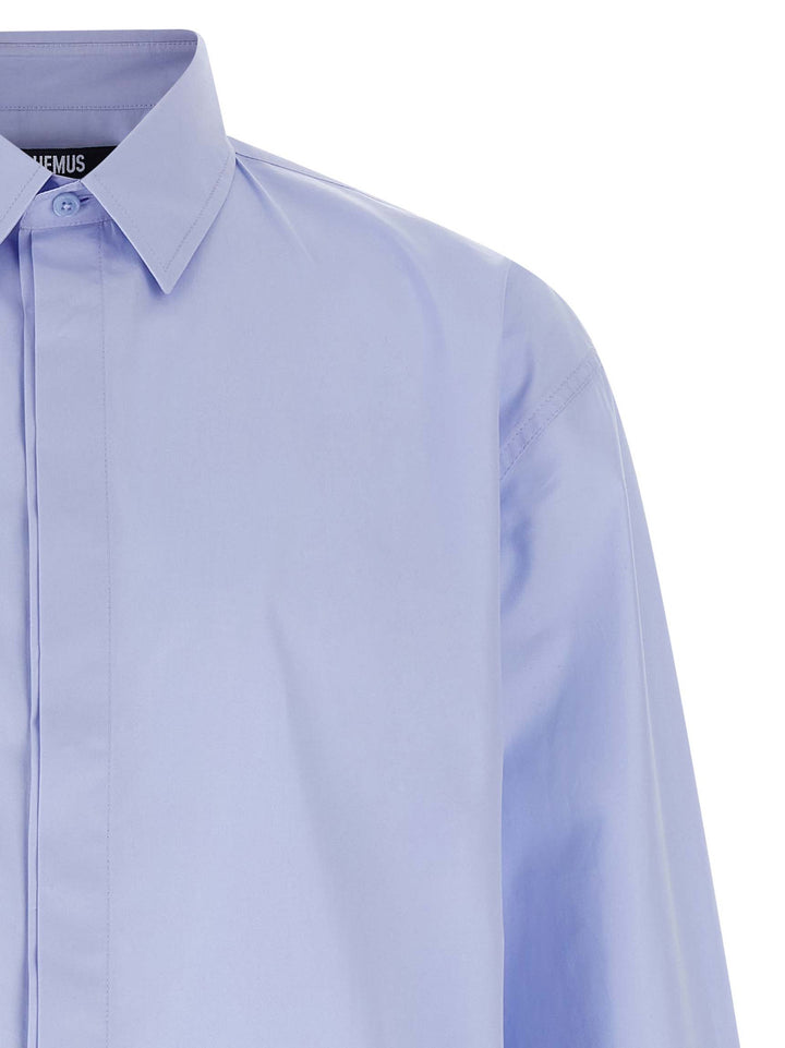 Jacquemus La Chemise Simon Shirt and Blouse - Light Blue | 921bbf0da3ed83da51ce2a6c449be091f89f24d5