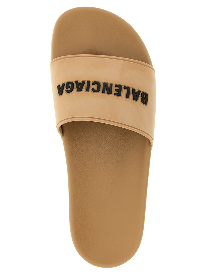 Balenciaga Slide Pool Sandals - Beige | 3ba2ce10e430147ec1d77e32aa110dc321ff993a