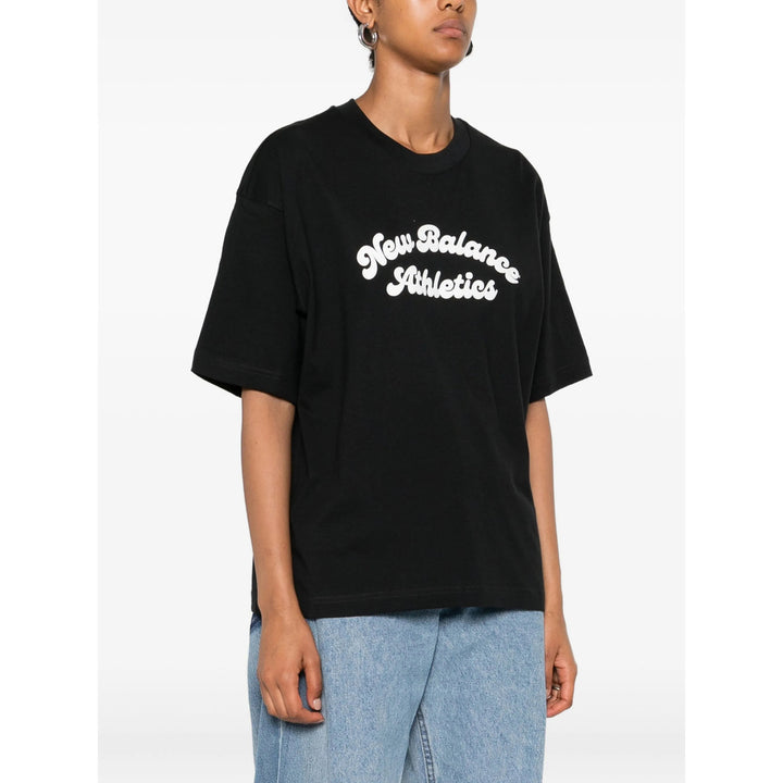 New Balance T Shirts - Black | 35bf6ba2612e5261741a4dcf87123d4d0204d246