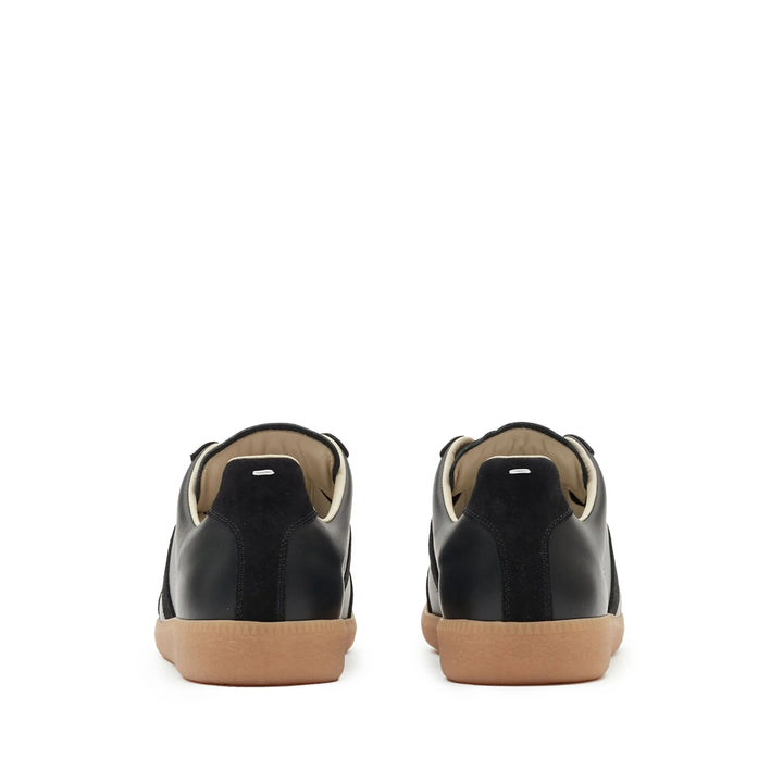 Maison Margiela Sneakers - Black | 7beac0d45807160319c2991fbd5b8f3a29569e31