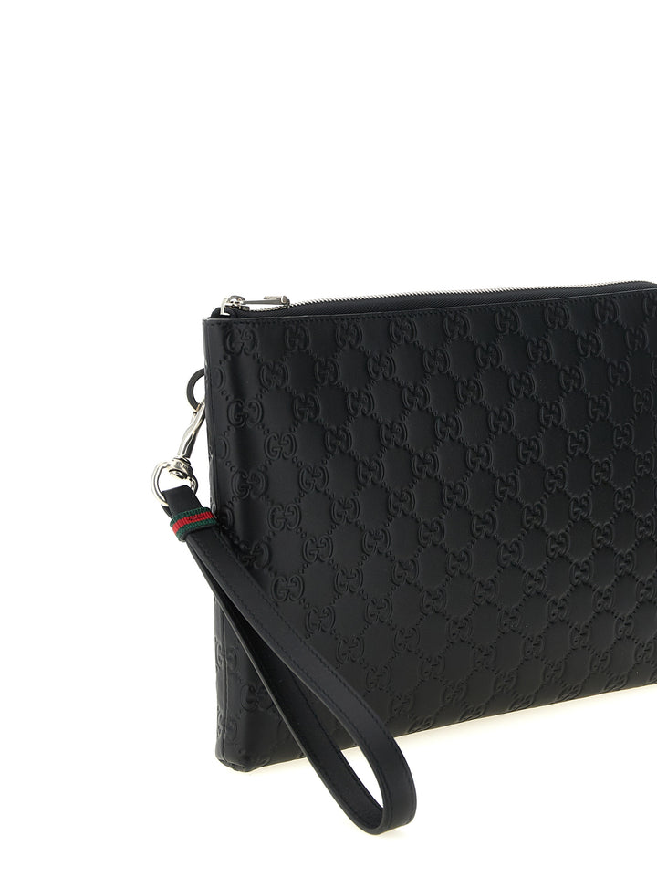 Gucci Gg Emblem Clutch - Black | 5e26b8c0a1de43b90776d4a4e9eb7c827dbf2e9a