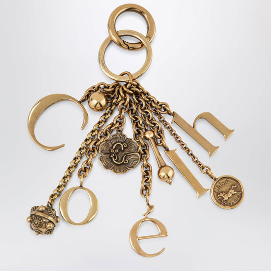 Bag Charm Keyring Symbols Logo In Vintage Gold Brass