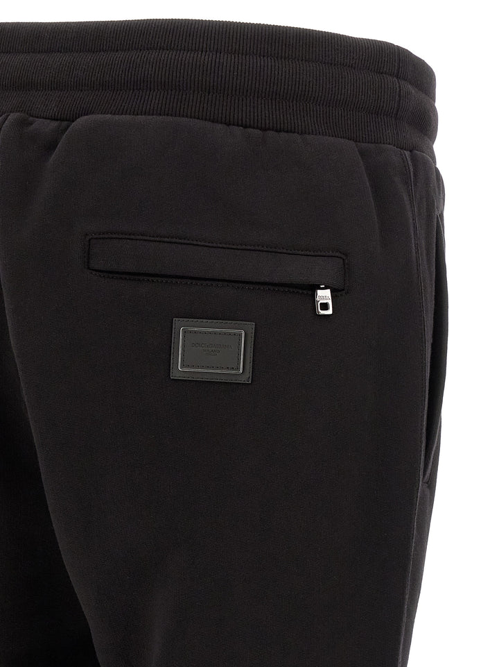 Dolce & Gabbana Logo Plaque Joggers Pants - Black | a66a404f233be4854e97df68237e56b6d542fb36