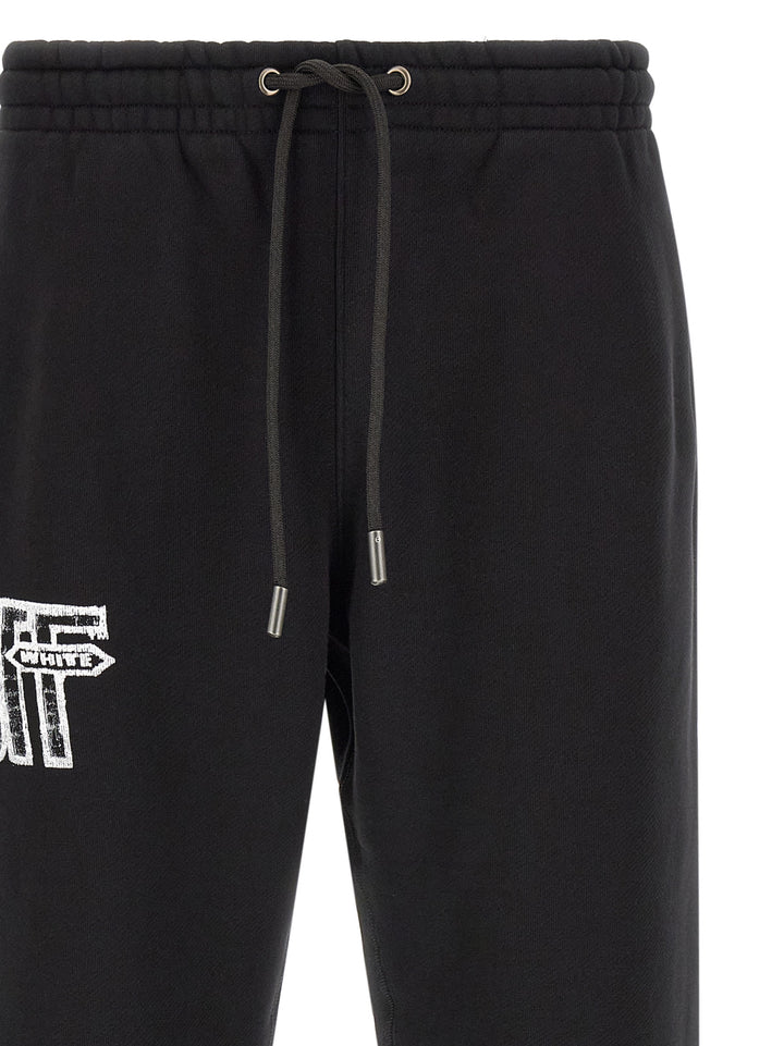 Off-White Motion Arrow Cuffed Pants - Black | 6b9136b166b5f675e23b9d765fbd323e9a4a9a11