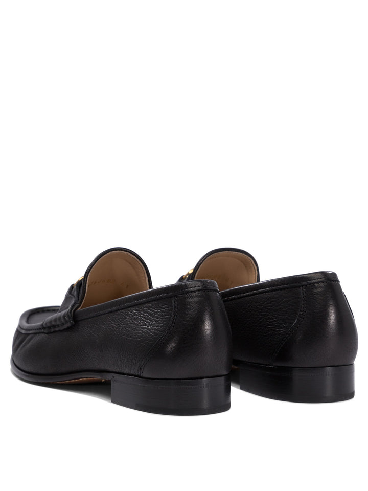 Valentino Garavani Vlogo Signature Loafers & Slippers - Black | 9951bbb40335ce17f8a208fb8bb037a87c6a38a9