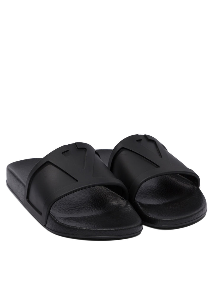 Valentino Garavani Slides With Vlogo Sandals - Black | 52d12be1f324fd263949733b43739802c98fc175