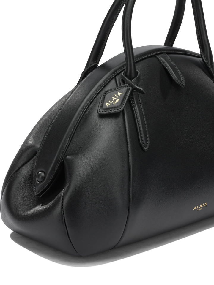 AlaïA Purse Top Handle Handbags - Black | ac78eb4893f22c7b70e91875ef02f363c37c7638