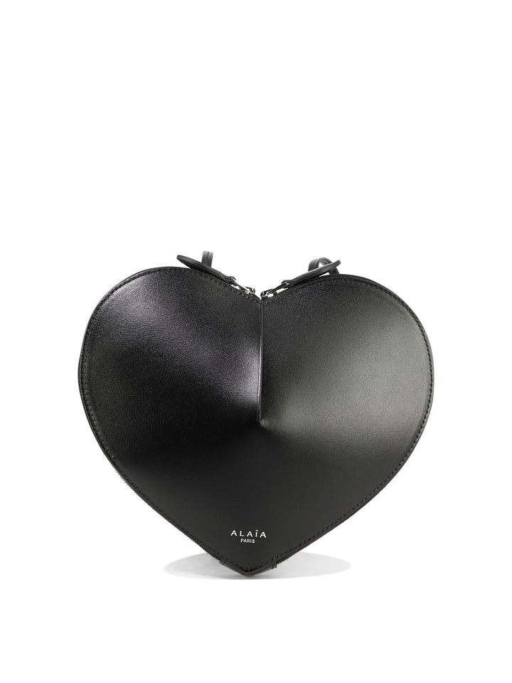 AlaïA Le Cœur Crossbody Bags - Black | bcbc9c32dd725a63ddcc0596223998818ce7987a