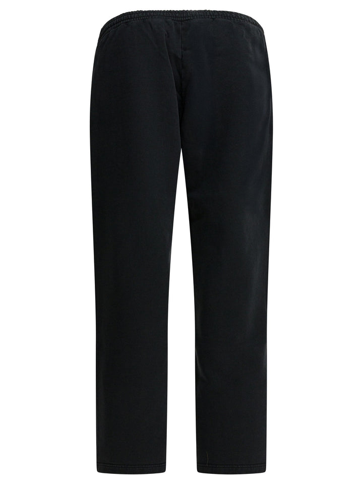 Balenciaga Baggy Cursive Trousers - Black | 399368e789b76bfb22c429ff0cb3954a6de85d0c