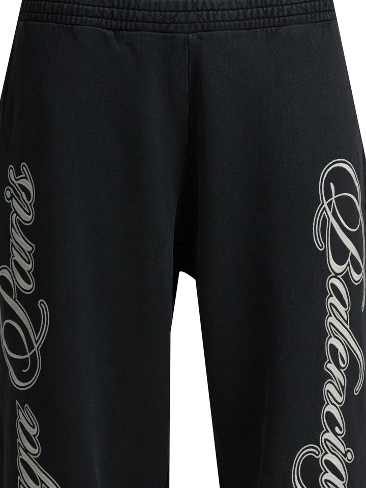 Balenciaga Baggy Cursive Trousers - Black | d8754ff90be2216f51eaf54b57744672188f98f9