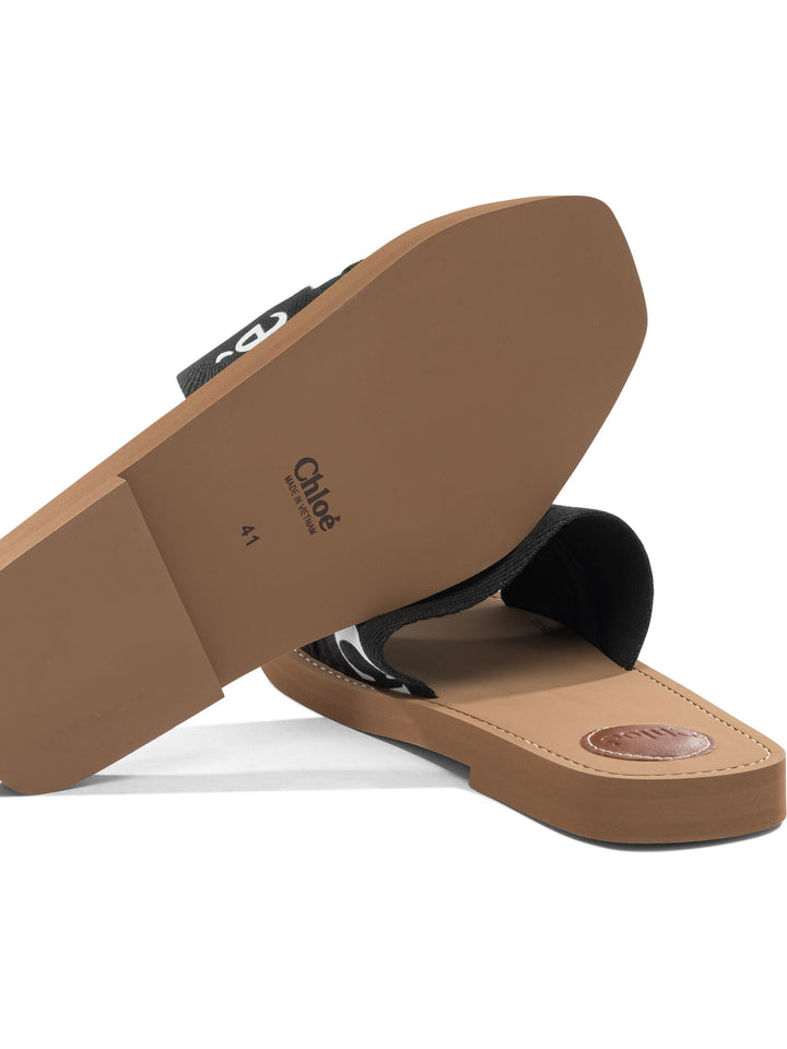 Chloé Woody Sandals - Black | acef08c6a05d0e77b05a54cd34ee0d6b8f39bb62