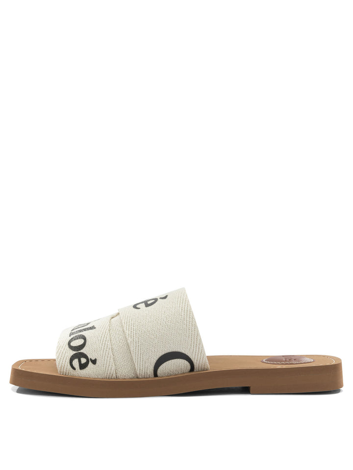 Chloé Woody Sandals - White | 25408b7a4cedf567849fadfe6aa4076ed9e9f5c7