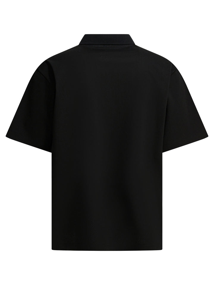 Sacai  Polo shirts - Black | c7794ecb1303198ba18f2cfe0b65587bc395c866