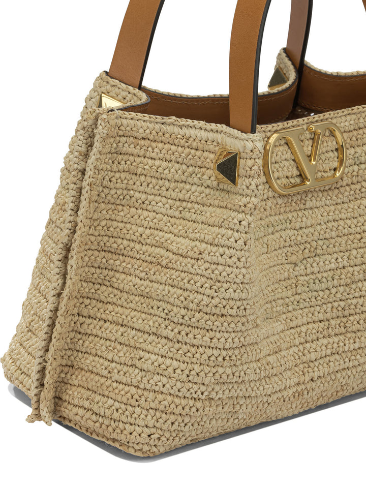 Valentino Garavani Vlogo Raffia Medium Handbag Handbags - Beige | 115587b12791873c29ae6aa3a6a6476e5d0d94ef