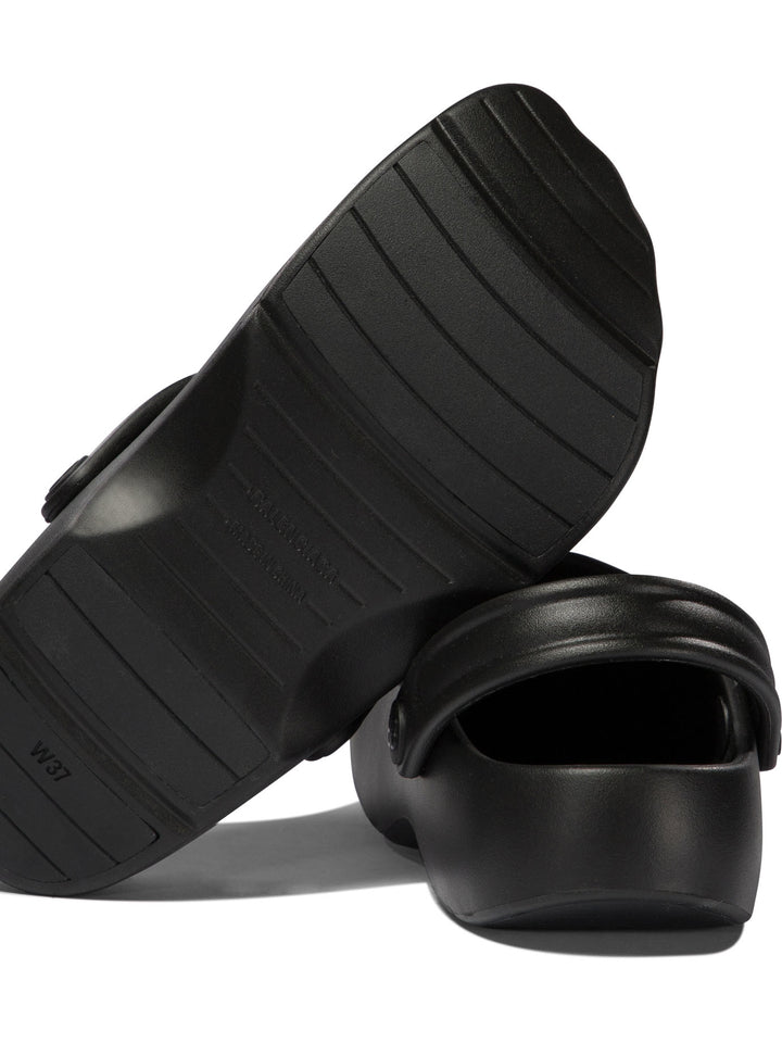 Balenciaga Sunday Molded Loafers & Slippers - Black | b66ec37bb7fd4098a758fd2fc47aaeb042a519e2