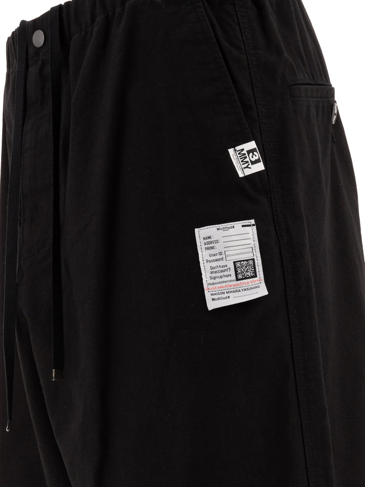 Maison Mihara Yasuhiro Ripstop Parachute Trousers - Black | 652c56faa56dc43e54550337ea734d1ff177c406