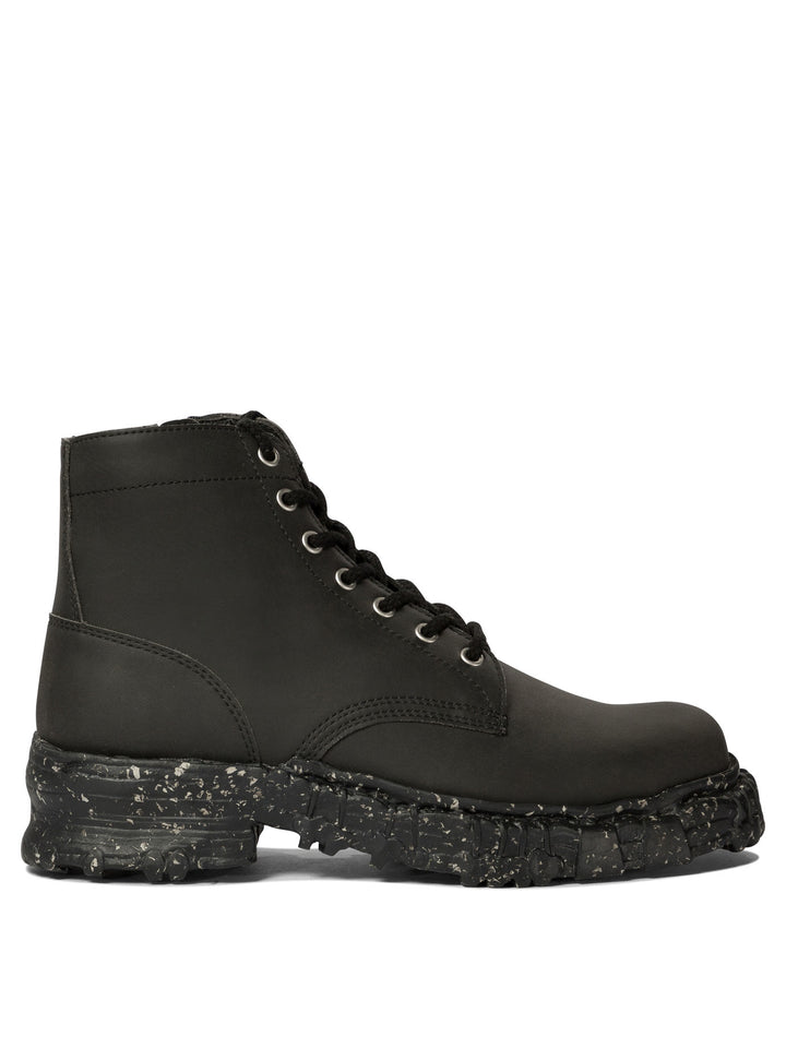 Maison Mihara Yasuhiro Vintage-Like Combat Boots - Black | 8f0b29664a1e2d45292a47d4ae9ce23ac72a3320