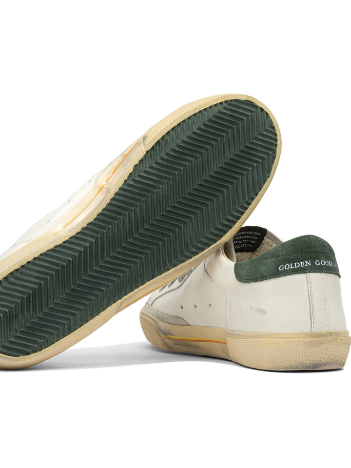 Golden Goose Super-Star Sneakers & Slip-On - White | 2567e9d31eca504ff0e2d12b6a8325756aa4c8c3