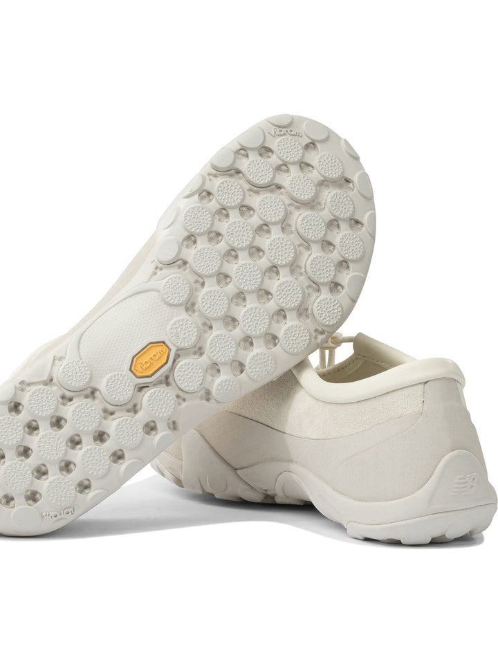 New Balance Tds Mt10t Sneakers & Slip-On - White | e7ac72d8478ed81e240a52a4fdcdcc7eece08b75