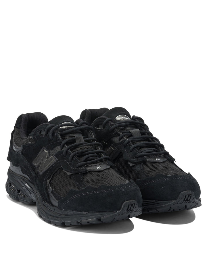 New Balance 2002dx Protection Pack Sneakers & Slip-On - Black | 33e4d237fbdbdad2ee06d556218bd3ff4a0a3cab