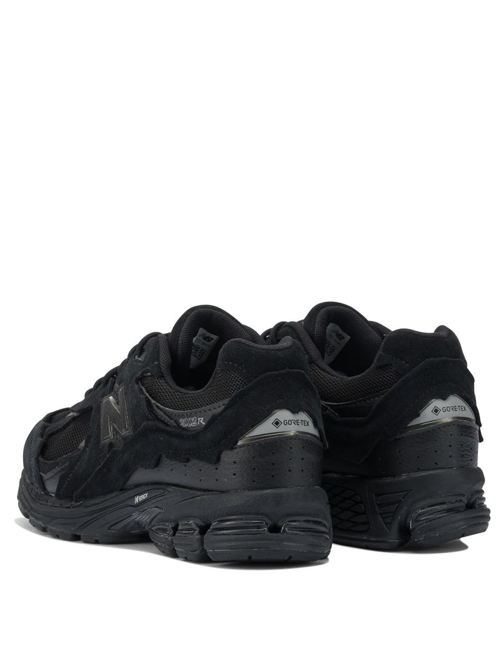 New Balance 2002dx Protection Pack Sneakers & Slip-On - Black | f9a2b89c38ea122c9884f76843e41f00a0f2cffd