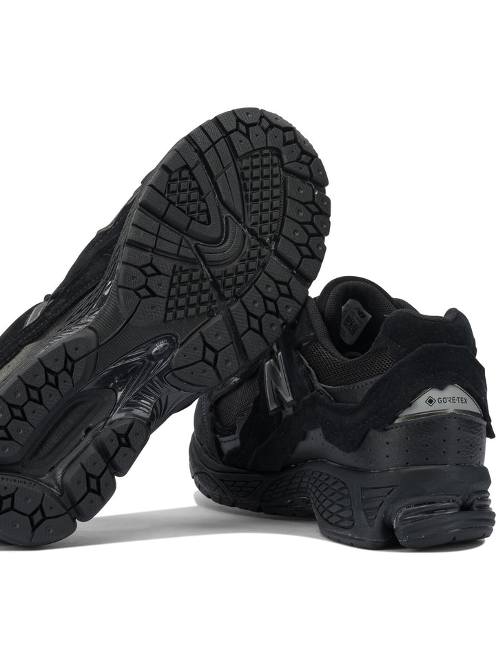 New Balance 2002dx Protection Pack Sneakers & Slip-On - Black | fdd735997f1b3e4780744113a9e70c939787943b