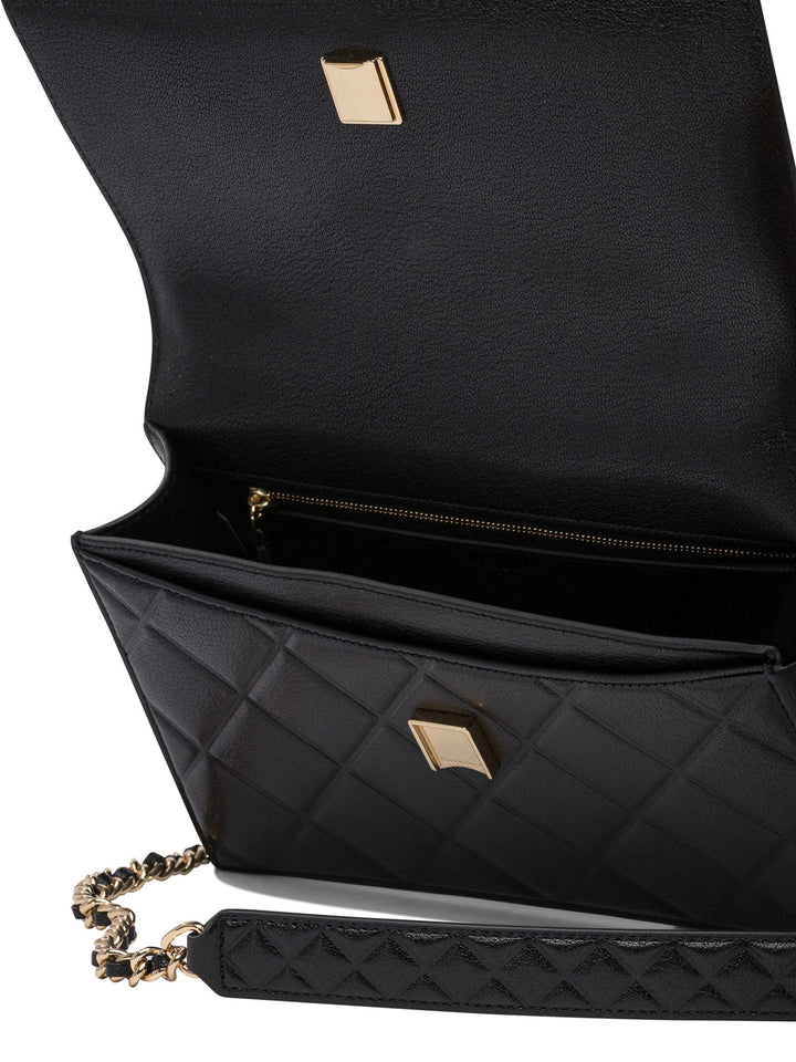 Tory Burch Fleming Convertible Shoulder Bag Shoulder Bags - Black | 9c901f9140b312d996ba35819c09b52097144b53