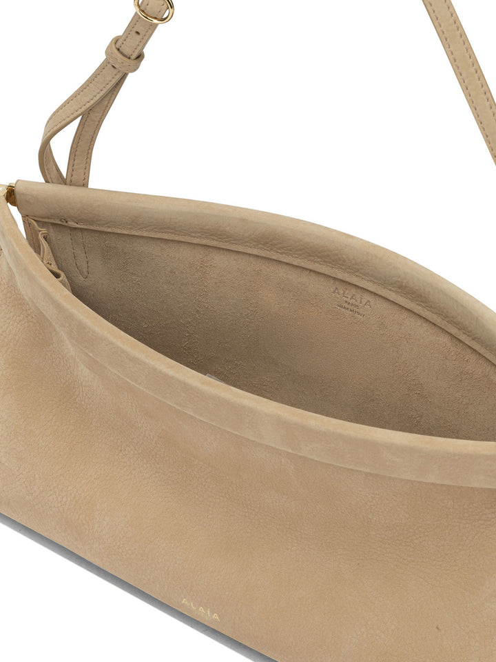 AlaïA Le Click East West Shoulder Bags - Beige | 48ea4ae474fa29fc54a42b9e0ba76c50e930e2b9