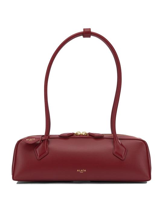 Le Teckel Shoulder Bags Red