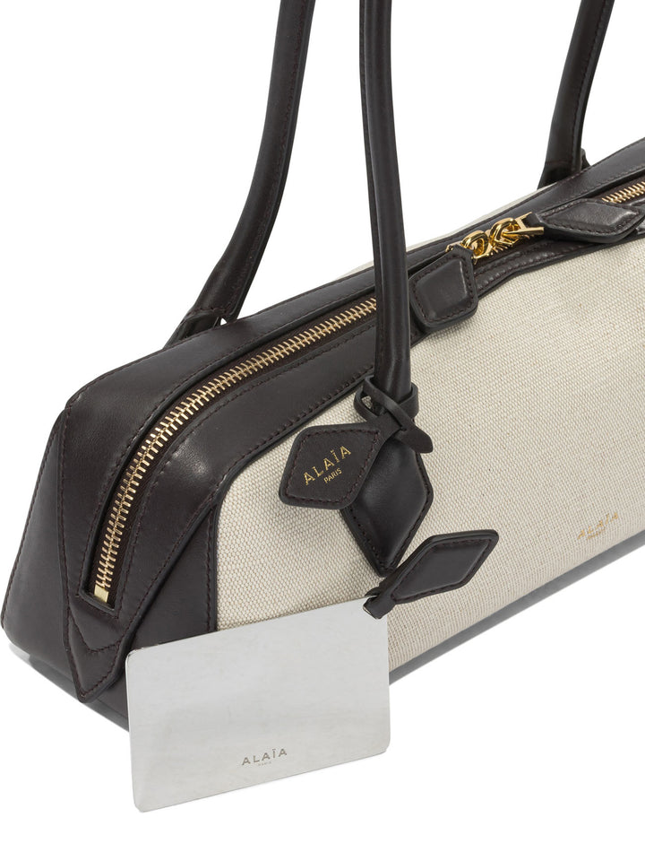 AlaïA Le Teckel Shoulder Bags - Beige | 4dcc9343b1c3167780527f289a0052575e83721b