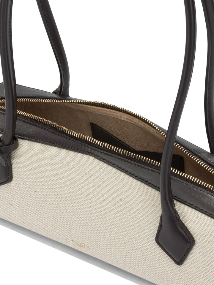 AlaïA Le Teckel Shoulder Bags - Beige | 95f780c3d19250acf1ce12095d1f55cf1e73bbc8