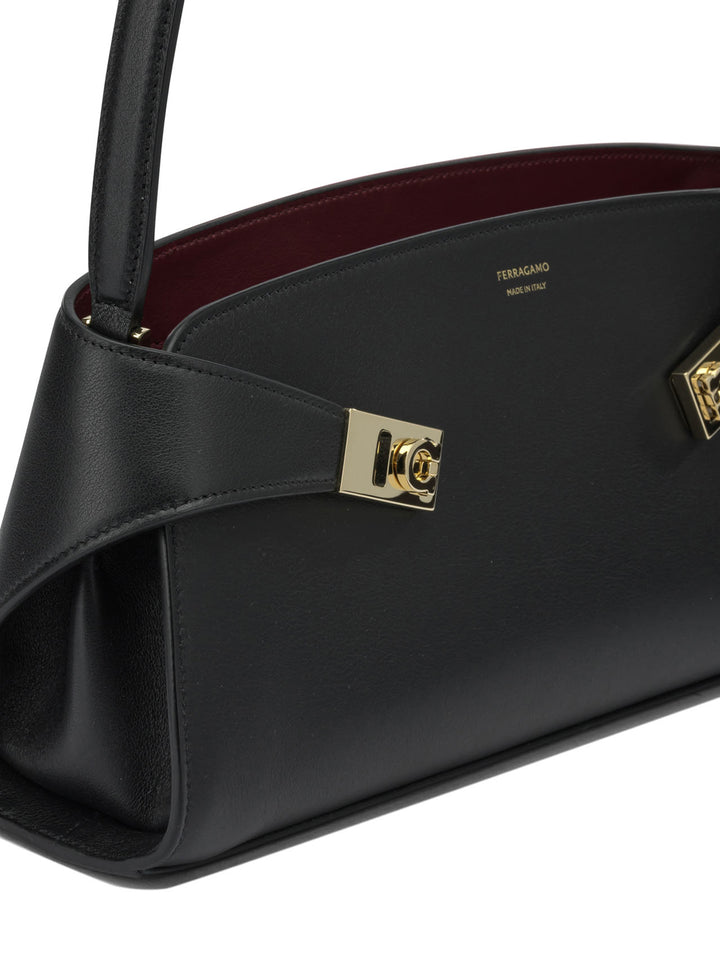Ferragamo Hug East-West Shoulder Bags - Black | 11d7a9c7ed46b631b5b8160c9895f4a6506db67e