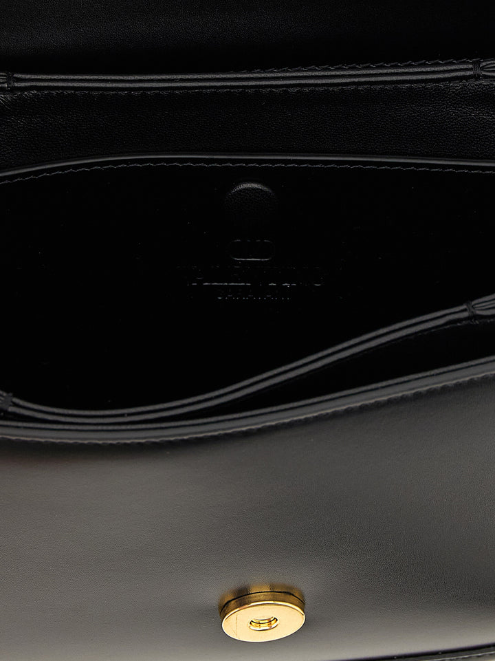 Valentino Garavani 9to5 Crossbody Bags - Black | a1c0f37755a73a3500f37200ada5837d46c5649a