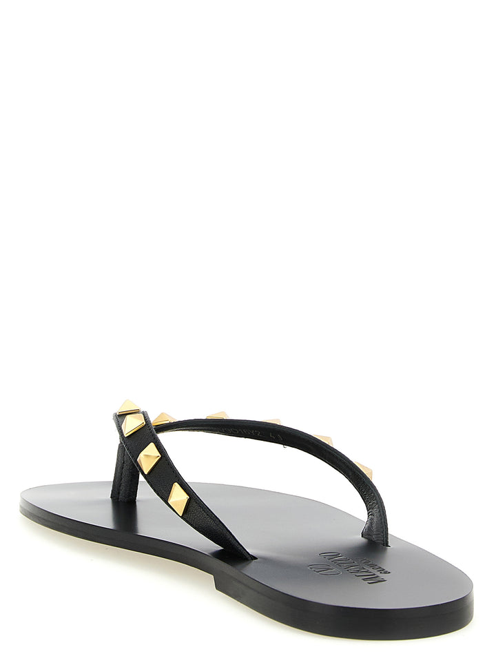 Valentino Garavani Thong Rockstud Sandals - Black | 3340ea3d6c449f41245db7569eb1dd81dc98c7f6
